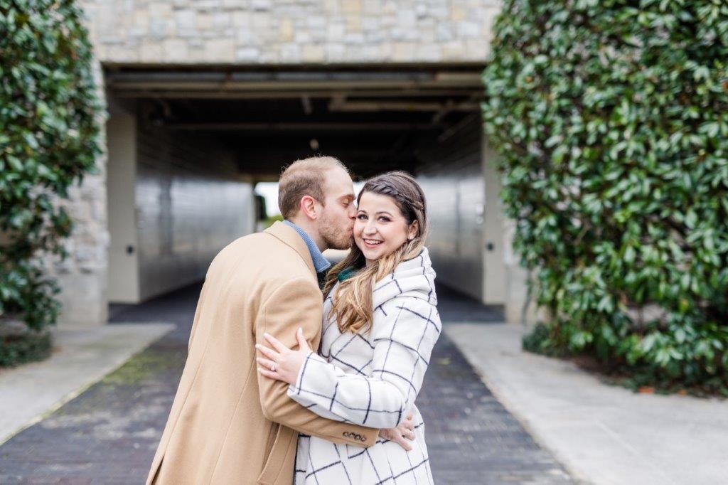 couple getting engagement photos at keeneland from a lexington ky wedding photographer