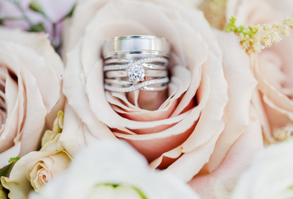 a wedding ring in a pink rose at clovernook country club
