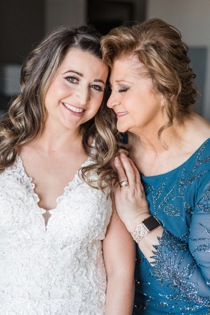 bride and her mom on her wedding day. taken by a cincinnati wedding photographer. 