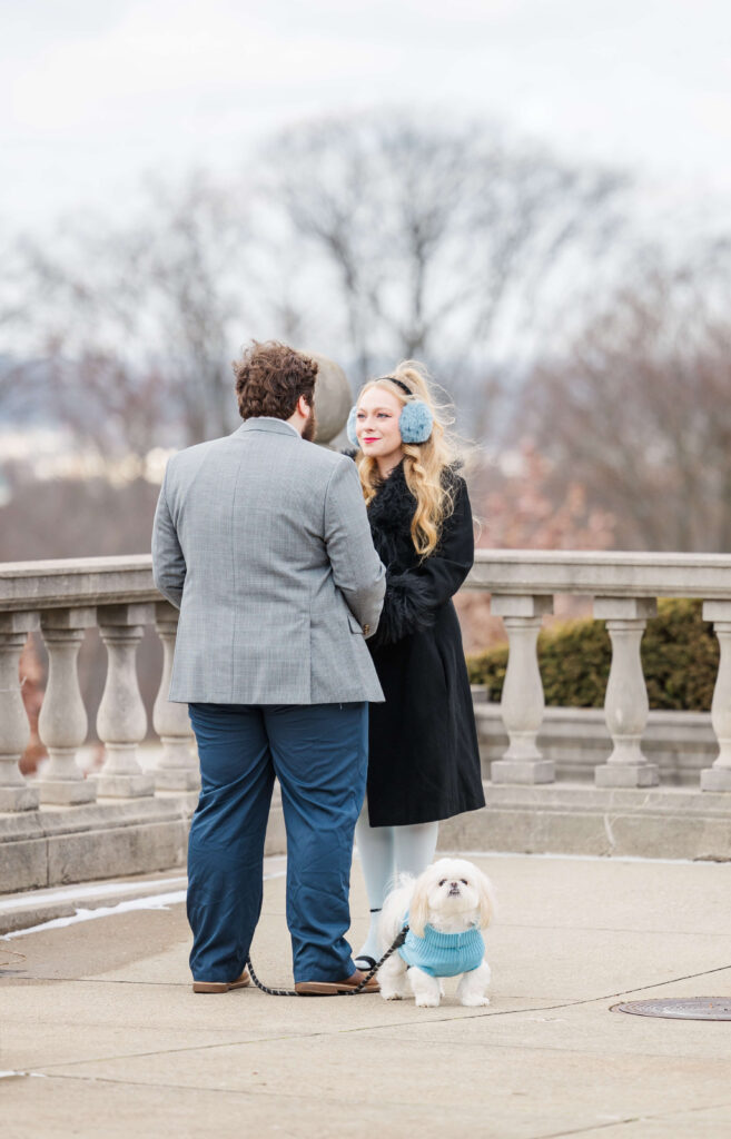 A man is about to propose to a woman at ault park. Ault park is a best place to propose Cincinnati. 