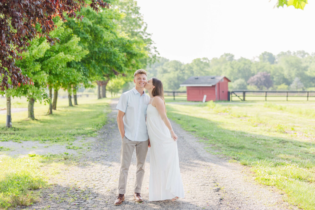 an engaged couple has their engagement session at hidden valley orchards. 